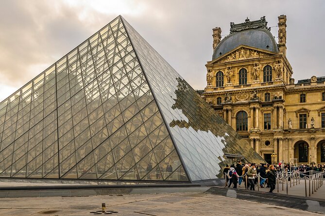 1 Day Paris City Tour on River & Land with Louvre Museum ticket - The Eiffel Tower and Champs-Elysees stops