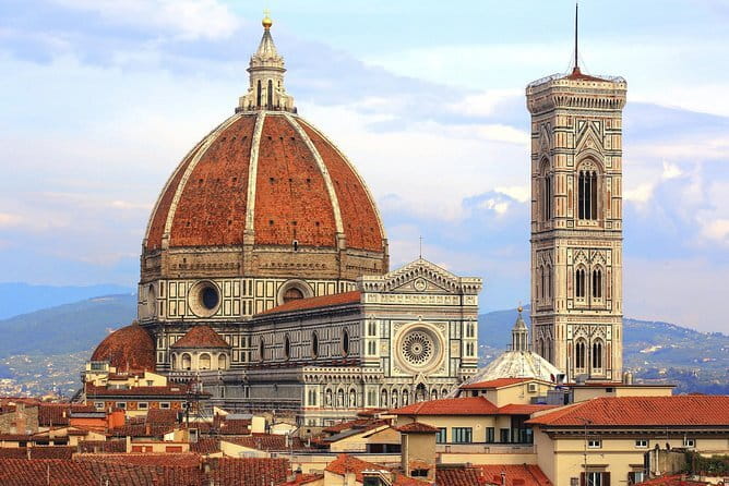 BE THE FIRST: Early Bird Florence Walking Tour & Accademia Gallery (David) - Orsanmichele and the market that became a church