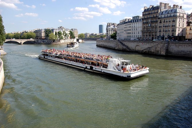 Day Trip to Paris with Eiffel Tower, Notre Dame and Louvre Museum - A one-hour Seine cruise
