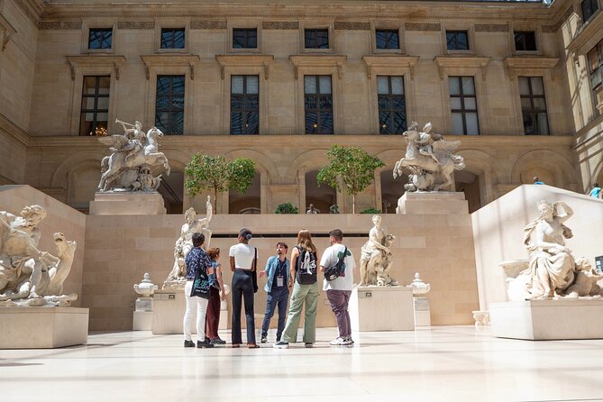 Fabuleux Guided Tour Through the Louvre Museum with Access - The Louvre entrance and the security pause