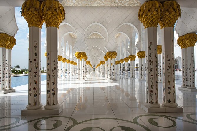 From Dubai: Abu Dhabi Full-Day Trip with Louvre & Mosque - Emirates Palace and the Presidential Palace drive