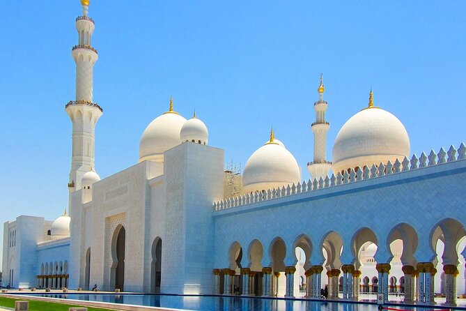 From Dubai: Abu Dhabi Premium Full-Day Sightseeing Tour & Louvre - Louvre Abu Dhabi beneath the silver dome