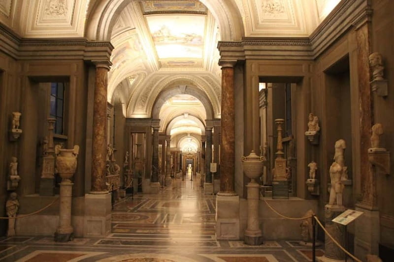 Guided Tour of Vatican Museum & Sistine Chapel - Maps, woven wall hangings, and Raphael Rooms