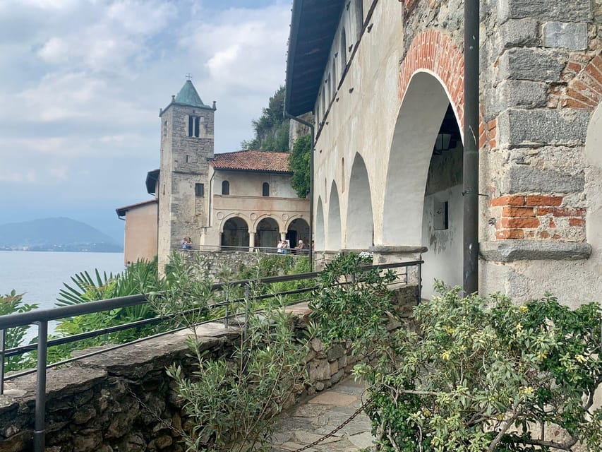 Lake Maggiore: Santa Caterina del Sasso Hermitage Ticket - Entering through the four Renaissance arches