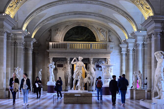Louvre Late Opening Guided Tiny Group Tour - Meeting beside Le Kiosque des Noctambules