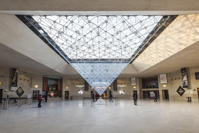 Louvre Museum Guided Tour with 1-Day Hop-On Hop-Off Bus Ticket - Starting at Arc du Carrousel