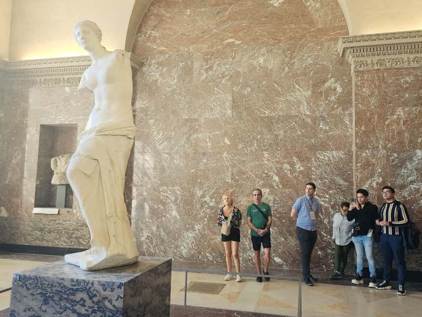 Louvre Museum Must-Sees Exclusive Guided Tour Entry Included - Winged Victory at the Daru staircase