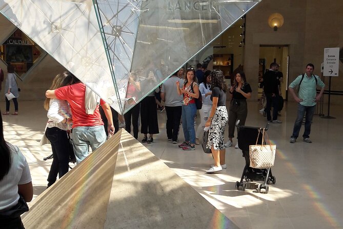 Louvre Museum Timed Entry Ticket with Audio Guide in 4 languages - Entering the Louvre at Your Scheduled Time