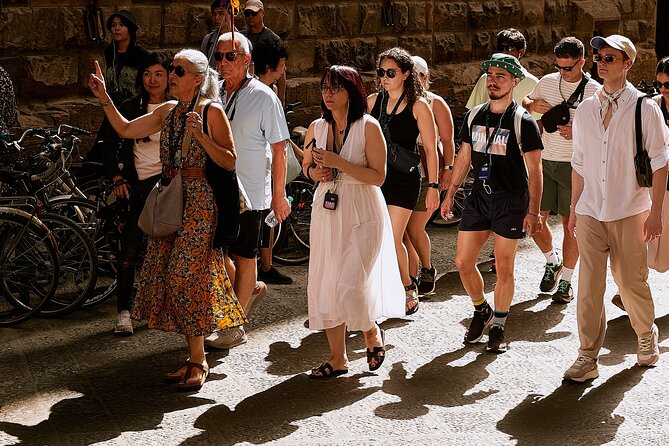 One Day Walking Tour with Accademia & Uffizi Gallery in Florence - Piazza della Signoria sets up the Uffizi