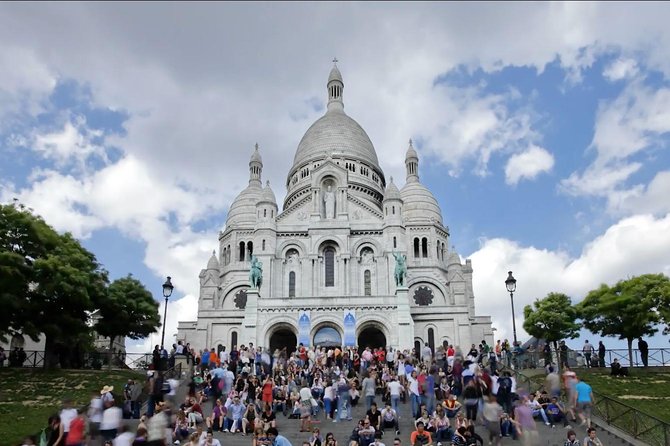 Paris Eiffel Tower, Notre Dame, Louvre and Montmartre Guided Tour - Montmartre: artists, windmills, and a steep start