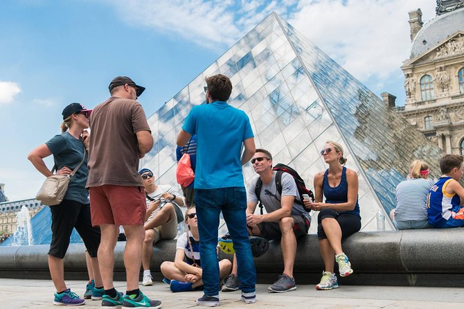 Paris Highlights Bike Tour: Eiffel Tower, Louvre and Notre-Dame - Concorde, Grand Palais, and the Champs-Elysées