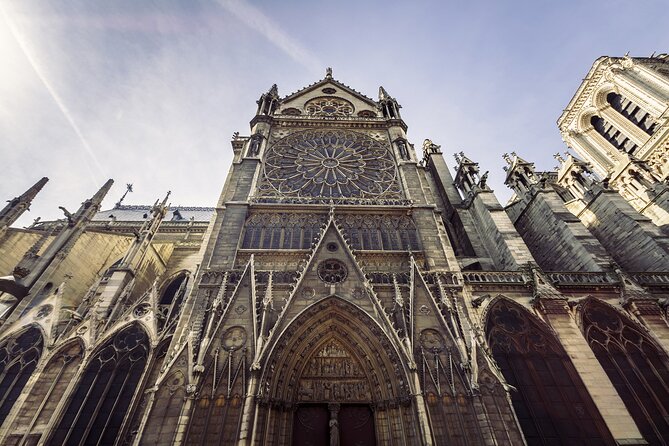 Paris in a Day: Louvre or Orsay, Eiffel Tower, City Walk & Cruise - Île de la Cité, Notre-Dame, and the Latin Quarter