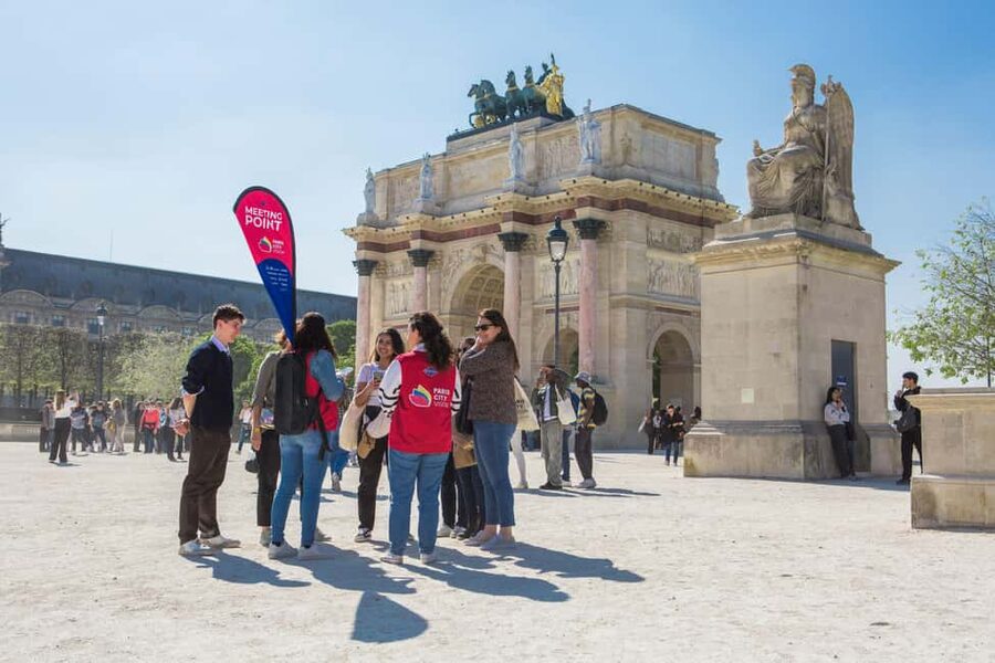 Paris: Louvre Museum Access with Host and Hop-On Hop-Off Bus - The hop-on hop-off bus and the one-day clock
