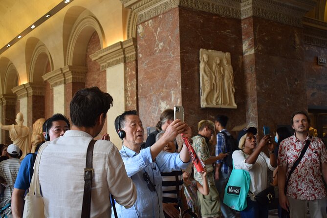 Paris Louvre Museum Private Guided Tour with Pre-Reserved Tickets - Entering through the Louvre Pyramid
