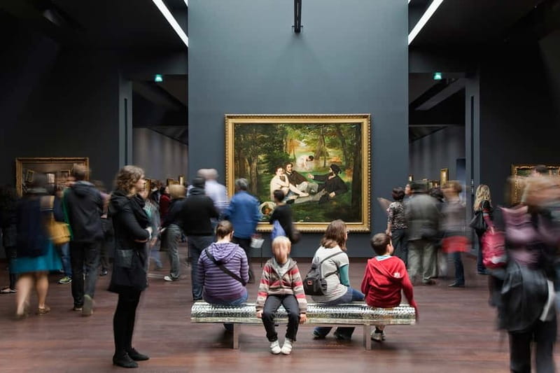 Paris: Musée d'Orsay Masterpieces Guided Tour - Entering a former railway station