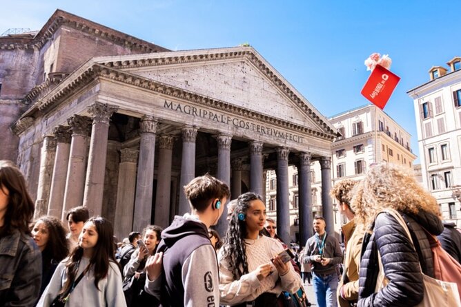 Rome in a Day Group Tour with Vatican Museums and Colosseum - Walking through the Roman Forum