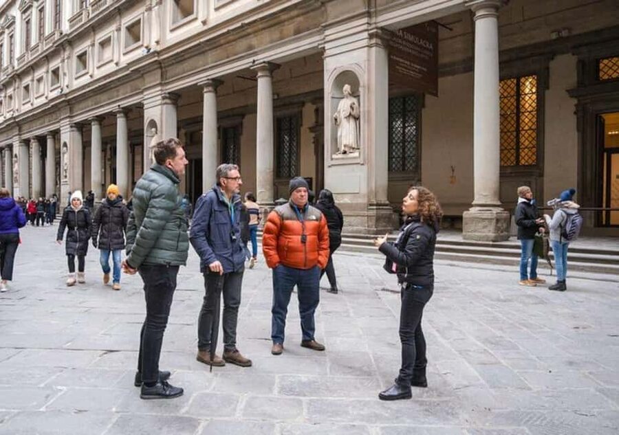 Semi Private Uffizi Gallery Guided Tour in Florence - Meeting the guide beside Leonardo’s statue