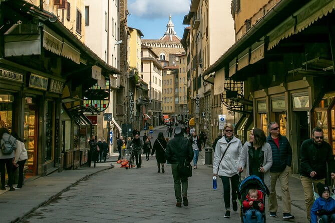 Skip-the-line full day tour of Florence highlights with Accademia Uffizi & David - Ponte Vecchio and a short pause by the Arno