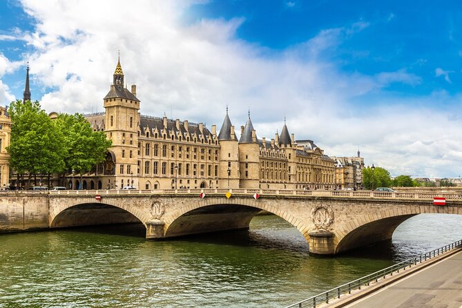 Skip-the-line Notre-Dame Cathedral, Louvre, Paris City Tour - The Seine and Pont Neuf
